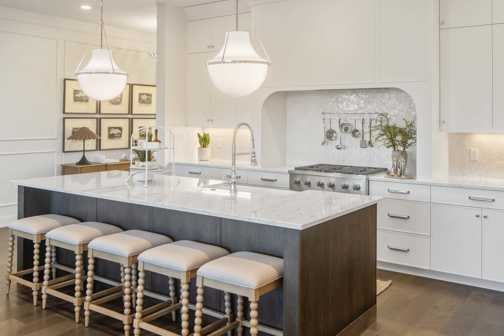 Evergreen Kitchen — Arched alcove, marble island, Wilkinson's pendant lights, bobbin stools, reeded island base